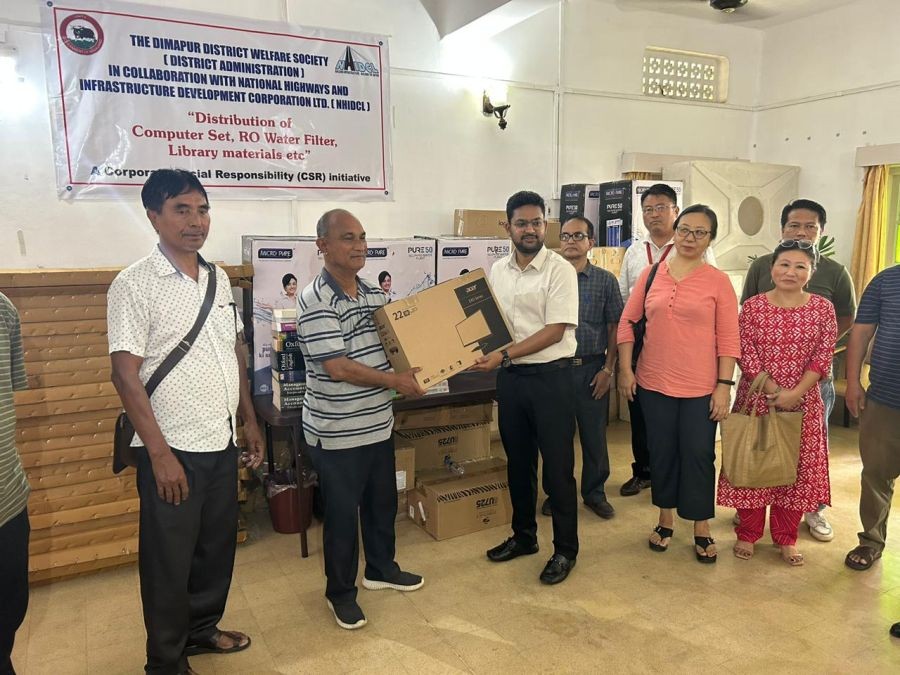 DC Dimapur Sachin Jaiswal IAS handing over computer sets as part of the charitable initiative of the Dimapur District Welfare Society.